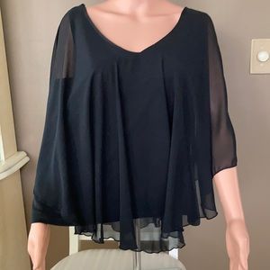 CKW woman’s black blouse.